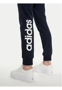 Adidas - adidas Spodnie dresowe Essentials Linear IC6869 Granatowy Slim Fit. Kolor: niebieski. Materiał: bawełna #5