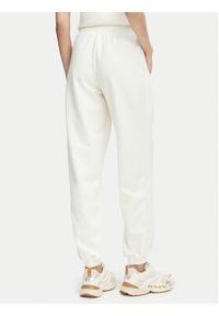 Guess Spodnie dresowe V6YB09 K4292 Kremowy Regular Fit. Kolor: kremowy. Materiał: syntetyk #5