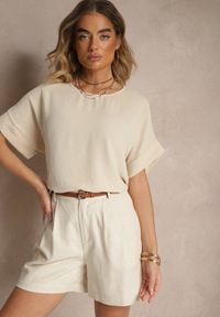 Renee - Beżowa Bluzka w Stylu Nietoperza Fadeasia. Okazja: na co dzień. Typ kołnierza: dekolt w serek. Kolor: beżowy. Styl: casual