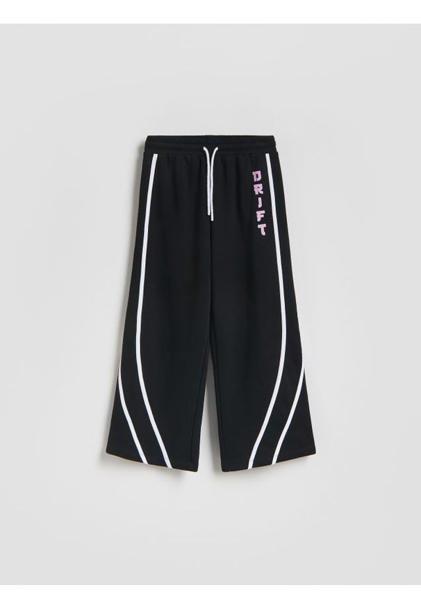 Reserved - Spodnie z lampasem - czarny. Kolor: czarny. Materiał: wiskoza, dzianina