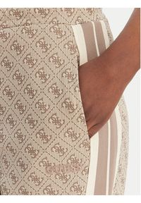 Guess Spodnie dresowe V6GB04 K2955 Beżowy Regular Fit. Kolor: beżowy. Materiał: syntetyk #4