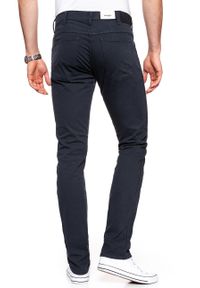 Wrangler - WRANGLER SPODNIE MĘSKIE LARSTON NAVY WASHED W18SHD49I. Materiał: materiał