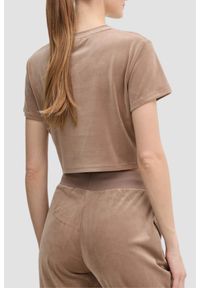 Guess - GUESS Brązowy top damski Couture Tee. Kolor: brązowy