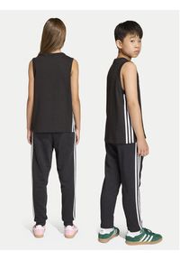 Adidas - adidas Spodnie dresowe 3 Stripes Pants KE2822 Czarny Regular Fit. Kolor: czarny. Materiał: syntetyk #3