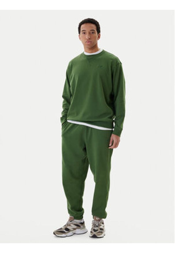 New Balance Spodnie dresowe MP41508 Zielony Relaxed Fit. Kolor: zielony. Materiał: bawełna