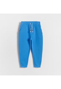 Reserved - Dresowe spodnie z kieszeniami - Niebieski. Kolor: niebieski. Materiał: dresówka #1