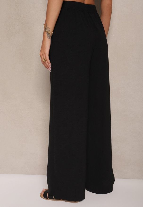 Renee - Czarne Spodnie z Wiskozą o Szerokim Kroju z Wiązanym Paskiem Zileindra. Okazja: na co dzień. Stan: podwyższony. Kolor: czarny. Materiał: wiskoza. Styl: klasyczny, casual, elegancki