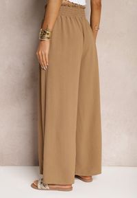 Renee - Jasnobrązowe Spodnie High Waist z Szerokimi Nogawkami i Gumką w Pasie Risabessa. Okazja: na co dzień. Stan: podwyższony. Kolor: brązowy. Styl: casual, elegancki