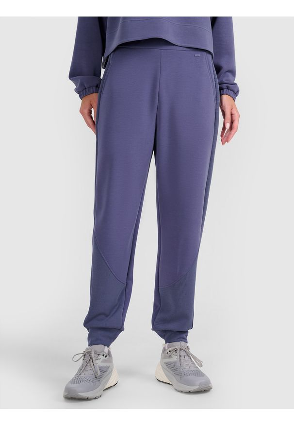 4f - 4F Spodnie dresowe joggery z modalem damskie - granatowe XXL. Kolor: niebieski. Materiał: dresówka. Wzór: gładki, ze splotem. Sport: fitness