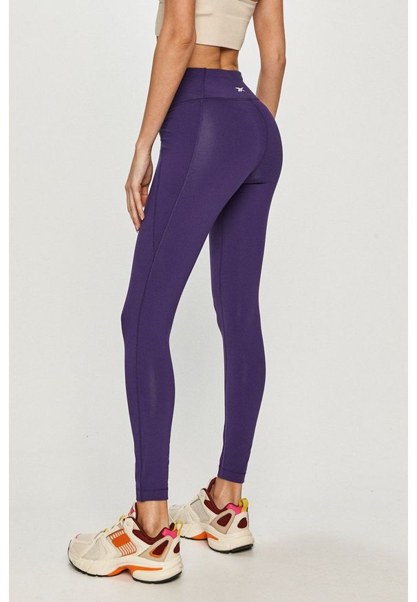 Reebok - Legginsy. Stan: podwyższony. Kolor: fioletowy. Materiał: dzianina, skóra