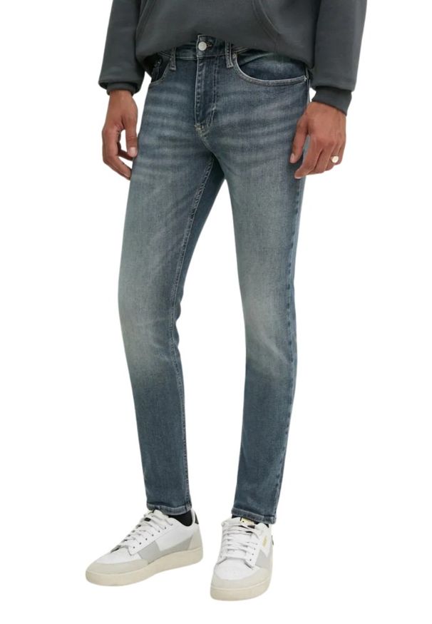 Tommy Jeans - TOMMY JEANS Niebieskie jeansy męskie. Okazja: na co dzień. Kolor: niebieski. Styl: casual