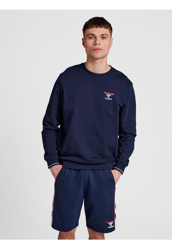 Bluza Hummel IC Dayton. Kolor: niebieski. Materiał: polar, tkanina
