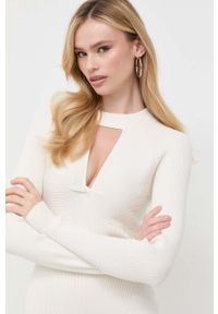 Guess sukienka kolor beżowy mini dopasowana. Kolor: beżowy. Materiał: materiał, dzianina, wiskoza. Długość rękawa: długi rękaw. Typ sukienki: dopasowane. Długość: mini #2