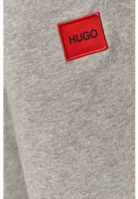 Hugo - Spodnie. Kolor: szary. Materiał: bawełna, materiał, dzianina, elastan. Wzór: gładki #5