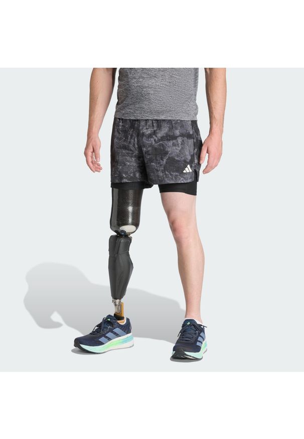 Adidas - Szorty Own The Run Spray Dye 2-In-1. Kolor: czarny, szary, wielokolorowy. Technologia: ClimaCool (Adidas). Sport: bieganie
