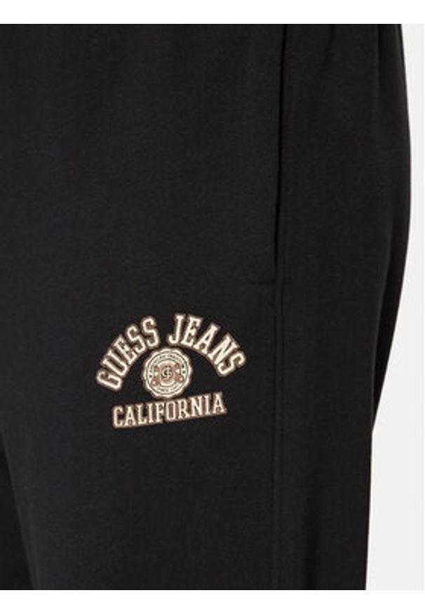 Guess Jeans Spodnie dresowe M5RB52 KCPR1 Czarny Regular Fit. Kolor: czarny. Materiał: bawełna