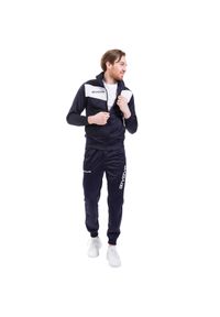 Dres Givova Tuta Visa Triacetato. Kolor: biały, wielokolorowy, niebieski. Materiał: dresówka