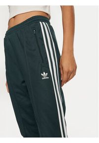 Adidas - adidas Spodnie dresowe Beckenbauer IY2226 Zielony Regular Fit. Kolor: zielony. Materiał: bawełna