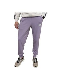 Puma - Spodnie Do Joggingu Męskie Logo ESS+. Kolor: fioletowy. Materiał: dresówka. Sport: bieganie