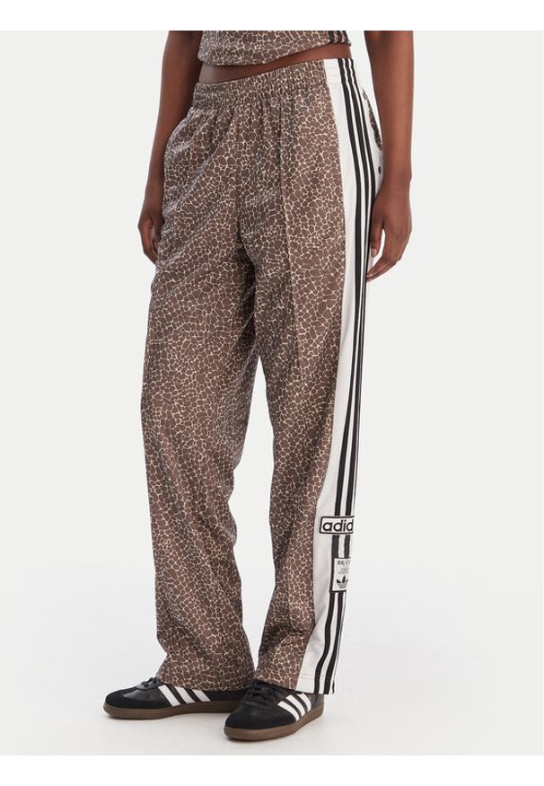 Adidas - adidas Spodnie dresowe Adibreak KD8820 Beżowy Loose Fit. Kolor: beżowy. Materiał: syntetyk