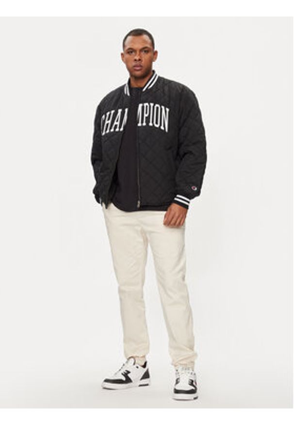 Champion Kurtka bomber 219897 Czarny Regular Fit. Kolor: czarny. Materiał: syntetyk