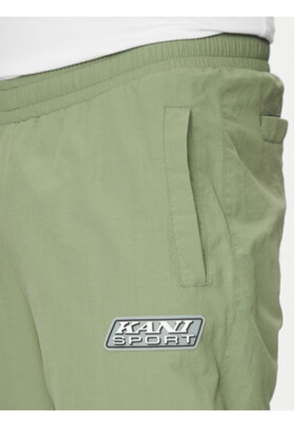 Karl Kani Joggery Essentia 60060039 Zielony Regular Fit. Kolor: zielony. Materiał: syntetyk