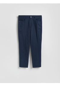 Reserved - Bawełniane spodnie slim fit - granatowy. Kolor: niebieski. Materiał: bawełna
