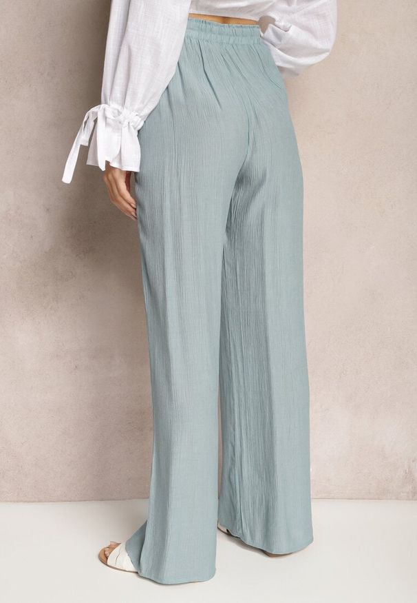 Renee - Jasnoniebieskie Szerokie Spodnie z Wiskozy i Gumką w Pasie Abyga. Okazja: na co dzień. Kolor: niebieski. Materiał: wiskoza. Styl: casual