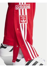 Adidas - adidas Spodnie dresowe adicolor Classics Adibreak IM8221 Czerwony Regular Fit. Kolor: czerwony. Materiał: syntetyk #2