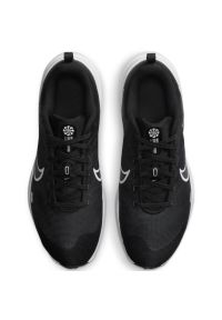 Buty do biegania Nike Downshifter 12 W DD9294 001 czarne. Okazja: na co dzień. Zapięcie: sznurówki. Kolor: czarny. Materiał: materiał, guma. Szerokość cholewki: normalna. Model: Nike Downshifter #7