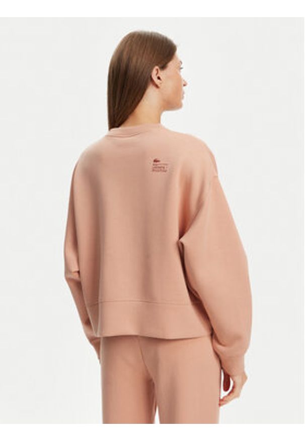 Lacoste Bluza SF5614 Pomarańczowy Oversize. Kolor: pomarańczowy. Materiał: bawełna