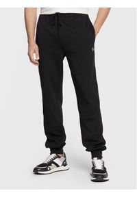 J.Lindeberg Spodnie dresowe Creed FMJS0651 Czarny Relaxed Fit. Kolor: czarny. Materiał: syntetyk, bawełna