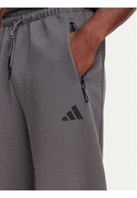 Adidas - adidas Spodnie dresowe Z.N.E. Open Hem KX7695 Szary ciemny Loose Fit. Kolor: szary. Materiał: syntetyk #2