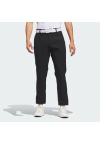 Adidas - Spodnie Ultimate365 Chino. Kolor: czarny. Materiał: materiał. Sport: golf