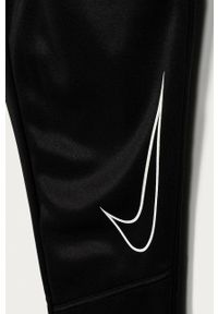 Nike Kids - Spodnie dziecięce 122-170 cm. Okazja: na co dzień. Kolor: czarny. Materiał: dzianina. Styl: casual