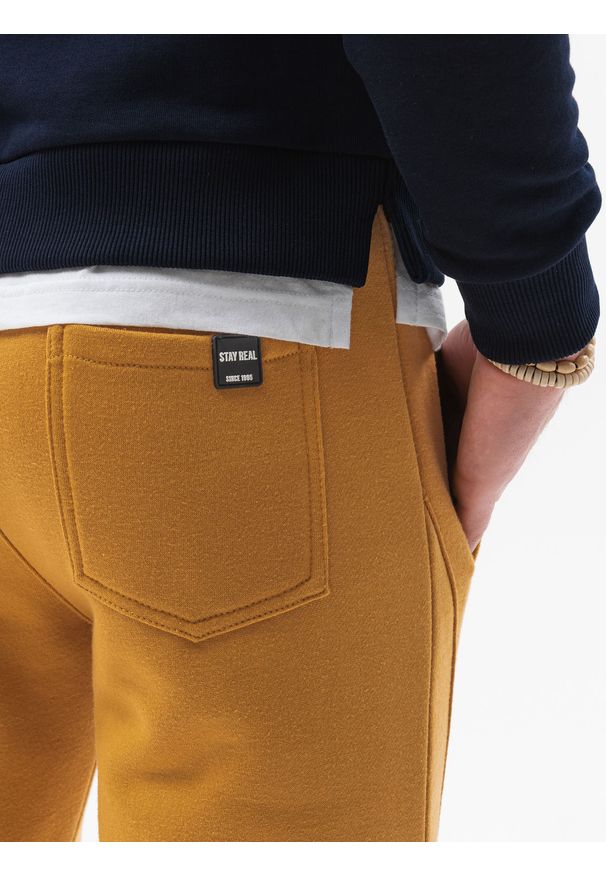 Żółte spodnie Ombre Clothing