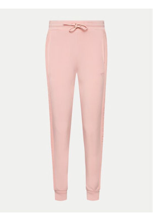 Guess Spodnie dresowe V2YB18 K7UW2 Różowy Regular Fit. Kolor: różowy. Materiał: wiskoza