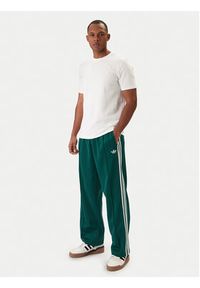 Adidas - adidas Spodnie dresowe adicolor KE3497 Zielony Loose Fit. Kolor: zielony. Materiał: syntetyk, bawełna #2