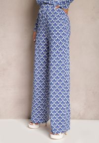 Renee - Niebieskie Spodnie o Szerokim Kroju w Ozdobny Print z Kieszeniami Ashel. Okazja: na co dzień. Kolor: niebieski. Wzór: nadruk. Styl: casual, elegancki #5
