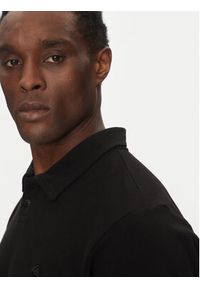 Quiksilver Polo EQYKT04375 Czarny Regular Fit. Typ kołnierza: polo. Kolor: czarny. Materiał: bawełna