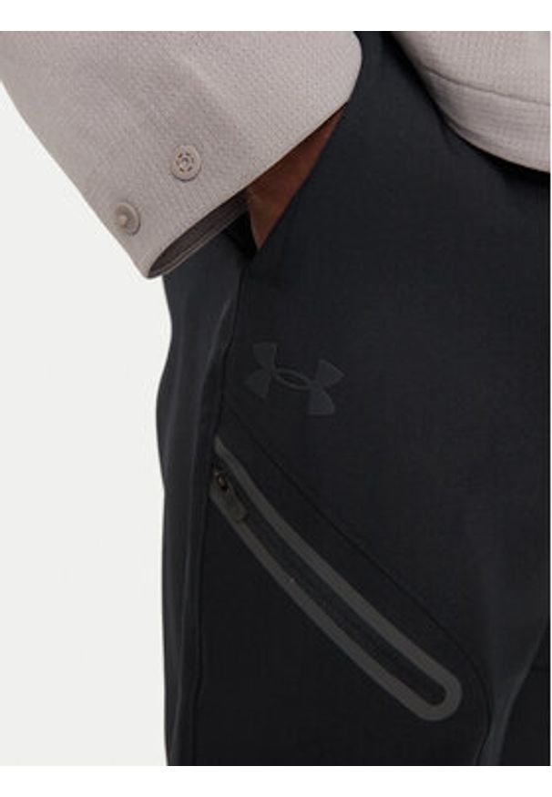 Under Armour Spodnie outdoor UA Unstoppable 1388823 Czarny Loose Fit. Kolor: czarny. Materiał: syntetyk. Sport: outdoor