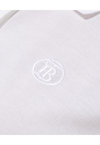 Burberry - BURBERRY - Biała koszulka polo. Typ kołnierza: polo. Kolor: biały. Materiał: bawełna. Wzór: haft. Styl: klasyczny