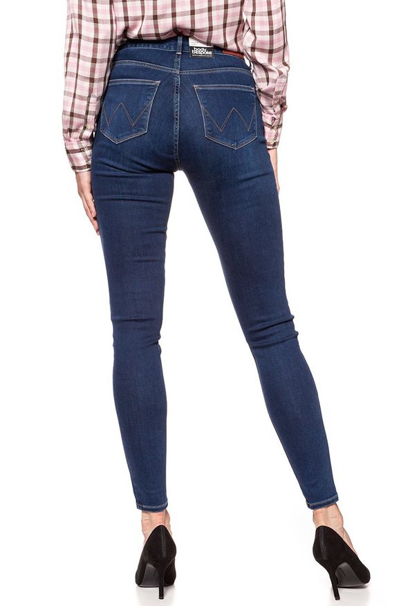Wrangler - WRANGLER HIGH SKINNY COSY FEEL W27HRL21L 112128114. Stan: podwyższony. Wzór: jednolity, aplikacja