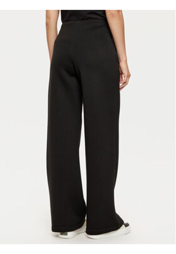 Calvin Klein Spodnie materiałowe K20K207947 Czarny Relaxed Fit. Kolor: czarny. Materiał: wiskoza