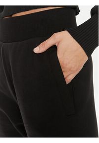 Calvin Klein Jeans Spodnie dresowe Bold Monologo J20J222606 Czarny Relaxed Fit. Kolor: czarny. Materiał: bawełna #4