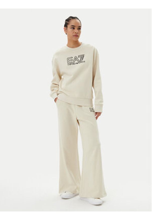 EA7 Emporio Armani Spodnie dresowe 7W000106 AF12473 U1079 Beżowy Loose Fit. Kolor: beżowy. Materiał: bawełna