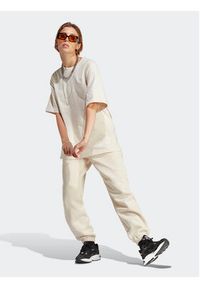 Adidas - adidas Spodnie dresowe Essentials Fleece IA6436 Écru Regular Fit. Materiał: bawełna #3