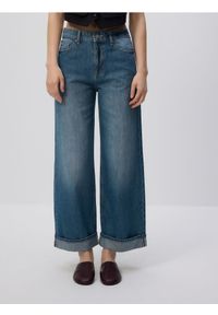 Reserved - Jeansy wide leg - granatowy. Kolor: niebieski