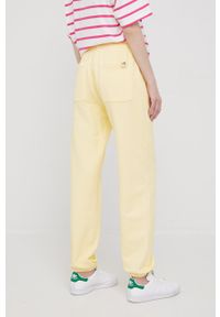 United Colors of Benetton spodnie dresowe bawełniane damskie kolor żółty gładkie. Stan: podwyższony. Kolor: żółty. Materiał: bawełna, dresówka. Wzór: gładki #5