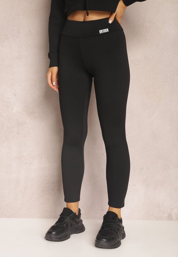 Renee - Czarne Legginsy z Gumką w Pasie Ismiphae. Stan: podwyższony. Kolor: czarny. Materiał: dzianina, polar. Długość: długie. Wzór: gładki, aplikacja